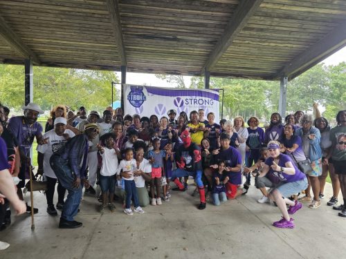 A group photo with Spiderman to celebrate VStrong picnic and Masse World Back to School 2024