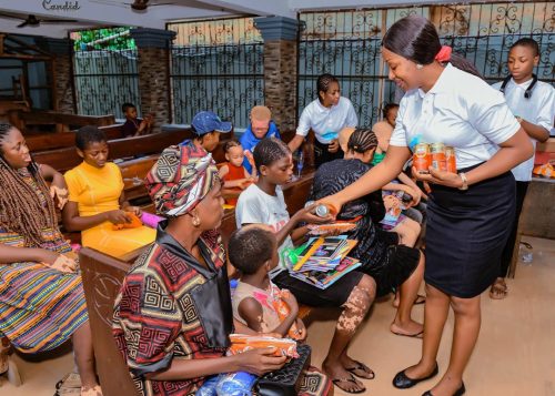 Distribution of snacks during Back to School supplies giveaway 